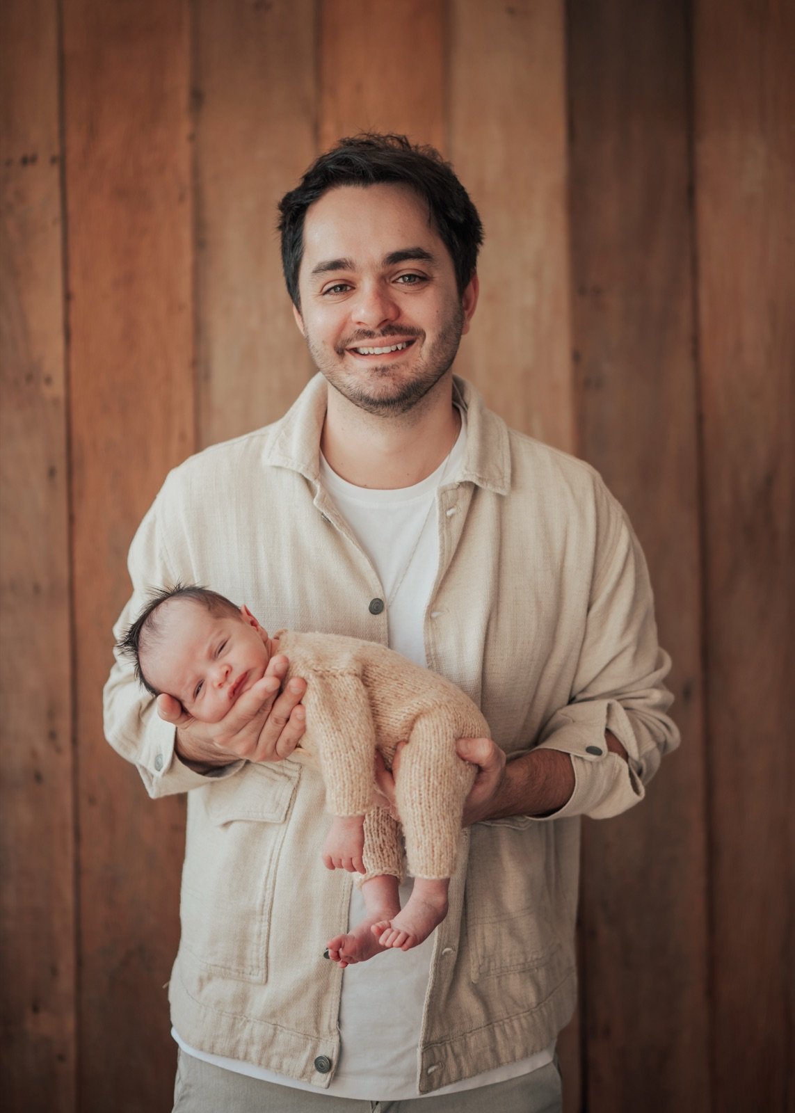 Família com bebê recém-nascido